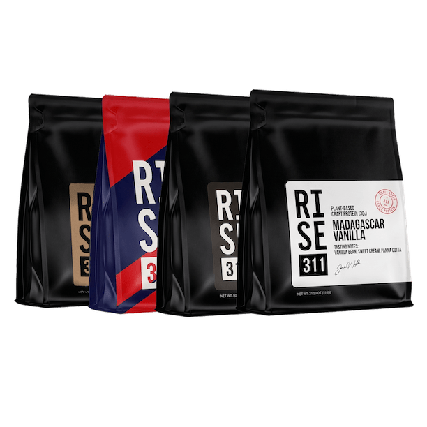 Four bags of RISE311 protein powder arranged in a row.