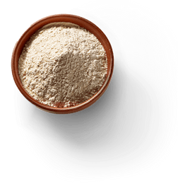 Leucine powder (from a natural fermented process) in a terracota bowl