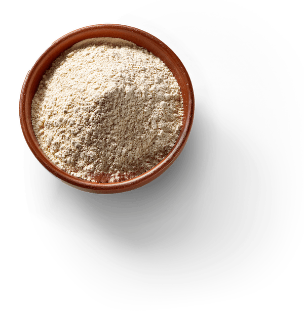 Leucine powder (from a natural fermented process) in a terracota bowl