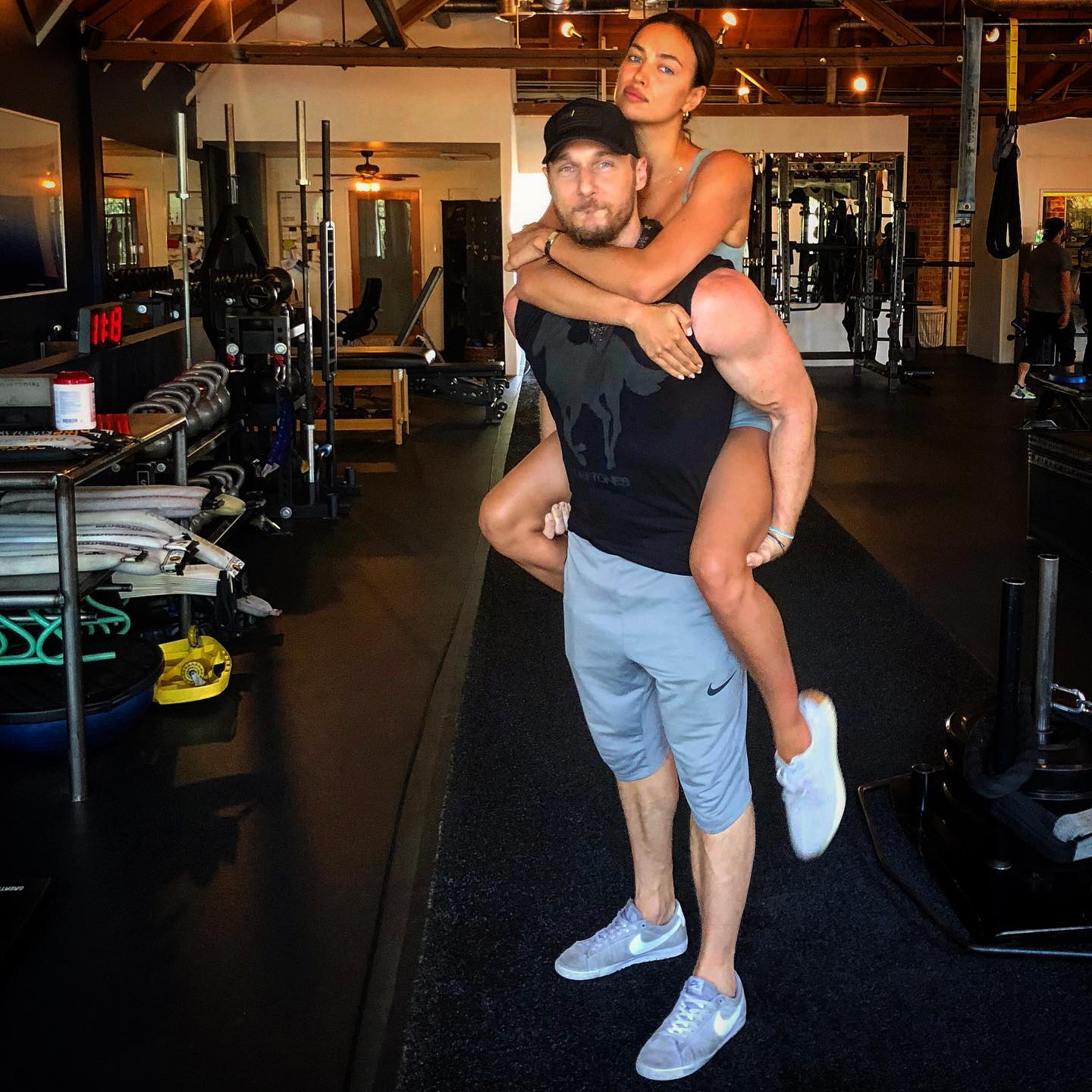 RISE311 founder Jason Walsh with model Irina Shayk having fun at the gym